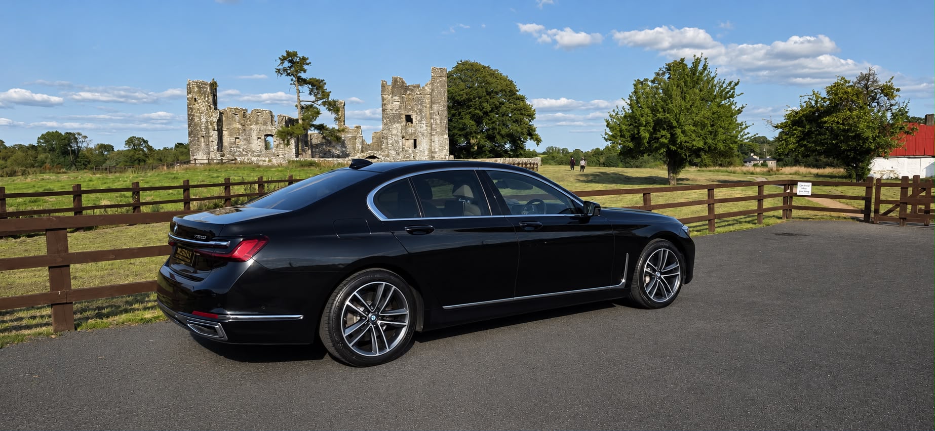 Murray Executive Chauffeurs BMW 7 Series at a historic location